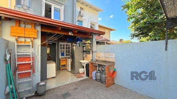 Casa Condominio em Porto Alegre, no bairro Cavalhada, com 3 dormitório(s), e 3 banheiros, à venda.