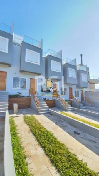 Casa 3 dormitórios no bairro Guarujá