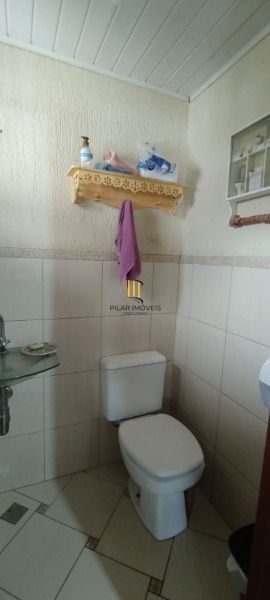 Casa 3 dormitórios no bairro Guarujá