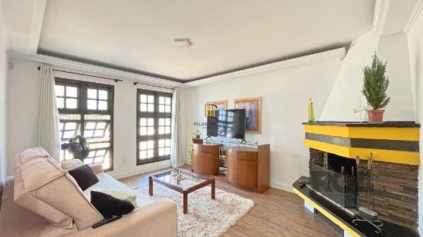 Casa 4 dormitórios no bairro Camaquã