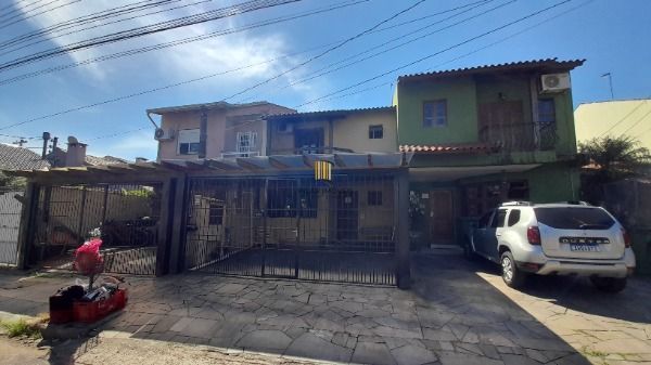 Casa em Porto Alegre, no bairro Hípica, com 3 dormitório(s), à venda.