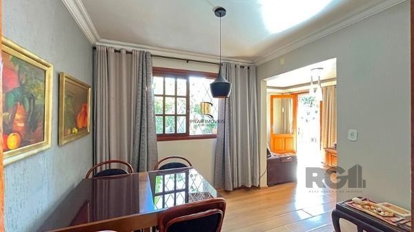 Casa Condominio em Porto Alegre, no bairro Santa Tereza, com 3 dormitório(s), e 3 banheiros, à venda.