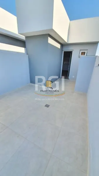 Casa 3 dormitórios no bairro Guarujá