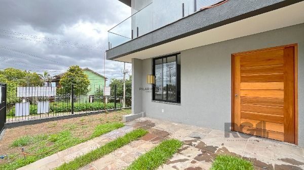 Casa Condominio em Porto Alegre, no bairro Tristeza, com 3 dormitório(s), e 3 banheiros, à venda.