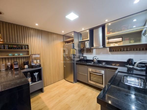 Casa em Porto Alegre, no bairro Vila Conceição, com 3 dormitório(s), e 3 banheiros, à venda.