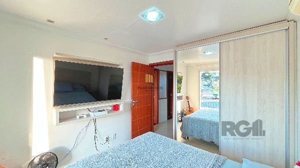 Casa em Porto Alegre, no bairro Hípica, com 3 dormitório(s), e 3 banheiros, à venda.