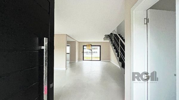 Casa Condominio em Porto Alegre, no bairro Hípica, com 3 dormitório(s), e 3 banheiros, à venda.