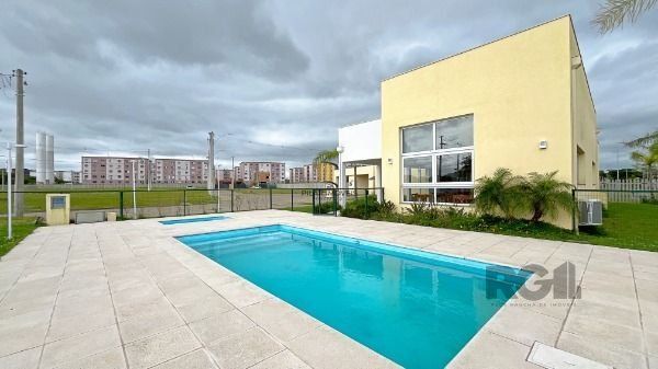 Casa Condominio em Porto Alegre, no bairro Hípica, com 3 dormitório(s), e 3 banheiros, à venda.