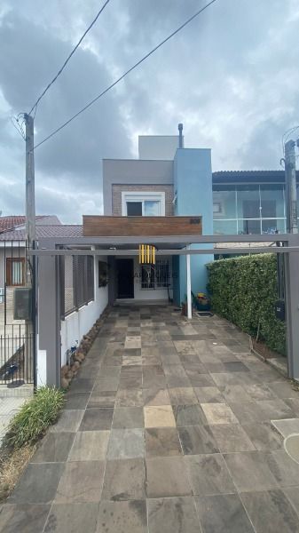 Ótima Casa com 3 dormitórios, semi mobiliada, pátio e vaga para carro.