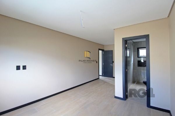 Casa em Porto Alegre, no bairro Hípica, com 3 dormitório(s), e 3 banheiros, à venda.
