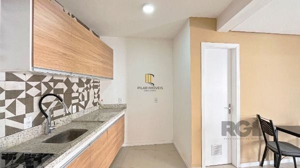 Casa Condominio em Porto Alegre, no bairro Ipanema, com 3 dormitório(s), e 3 banheiros, à venda.