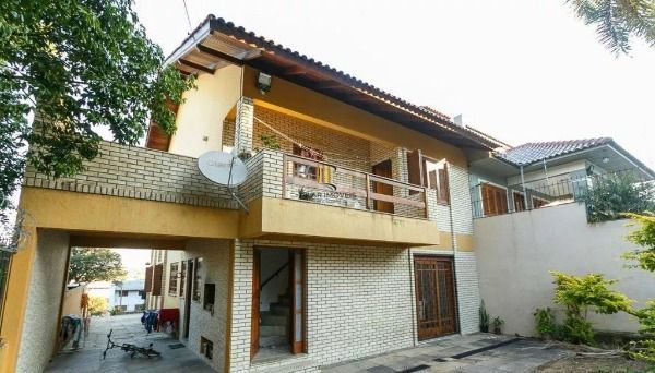 Casa em Porto Alegre, no bairro Cavalhada, com 5 dormitório(s), e 5 banheiros, à venda. - Pilar Imóveis