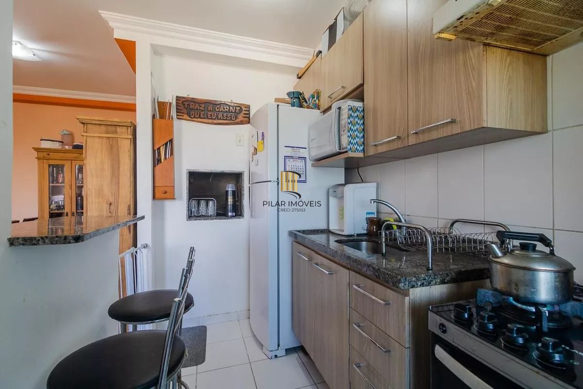 Apartamento 2 dormitórios, com suíte, churrasqueira, e vaga escriturada.