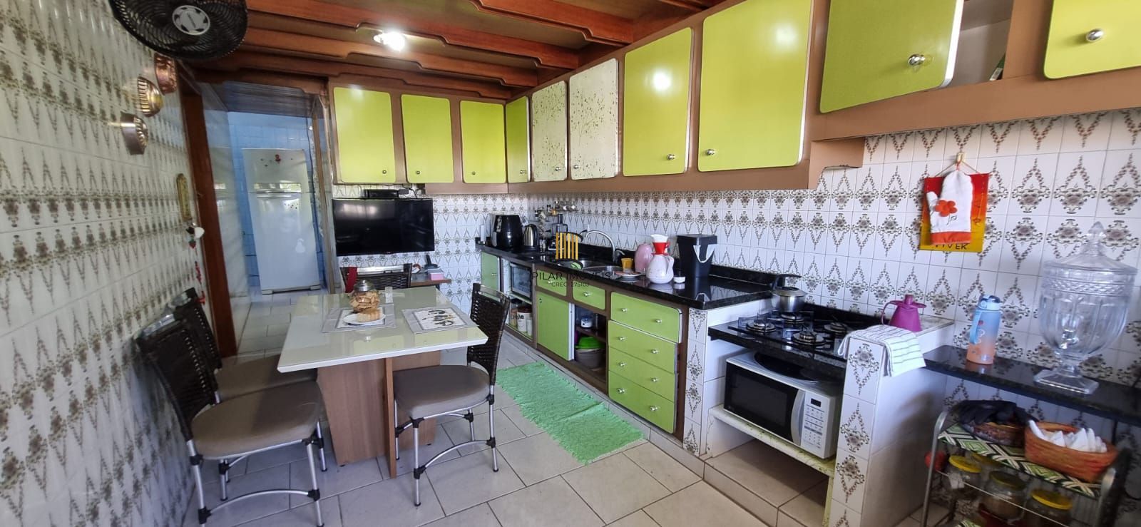 Casa com pavilhão