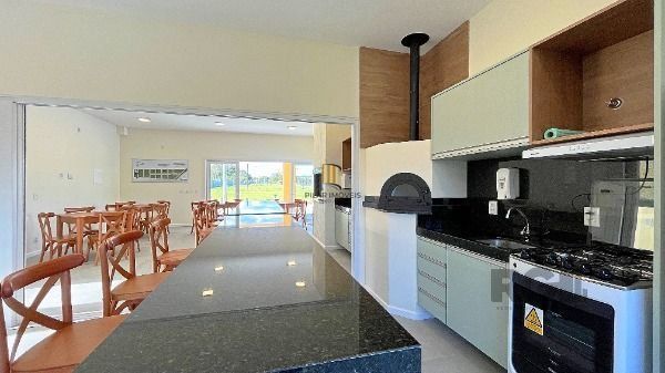 Casa Condominio em Porto Alegre, no bairro Hípica, com 3 dormitório(s), e 3 banheiros, à venda.