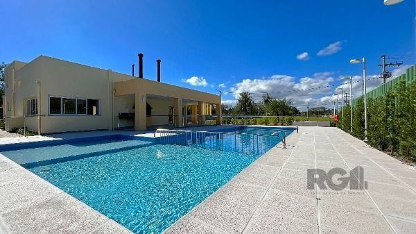 Casa Condominio em Porto Alegre, no bairro Hípica, com 3 dormitório(s), e 3 banheiros, à venda.