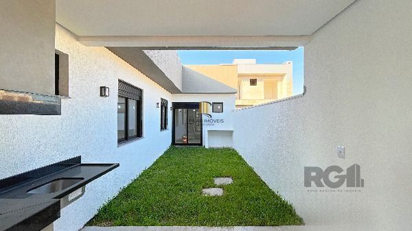 Casa Condominio em Porto Alegre, no bairro Hípica, com 3 dormitório(s), e 3 banheiros, à venda.