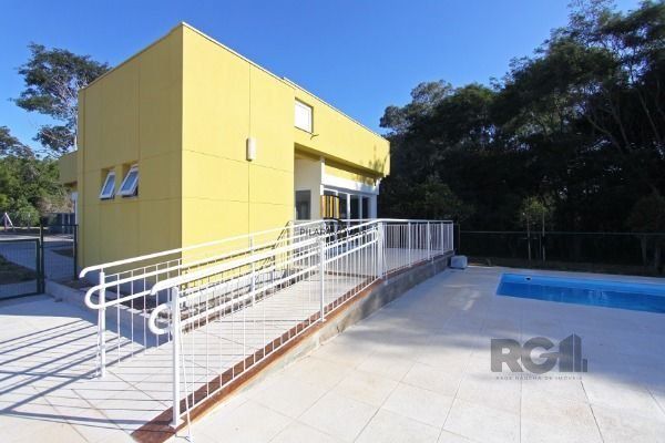 Casa Condominio em Porto Alegre, no bairro Campo Novo, com 3 dormitório(s), e 3 banheiros, à venda.