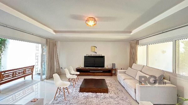 Casa Condominio em Porto Alegre, no bairro Hípica, com 3 dormitório(s), e 3 banheiros, à venda.