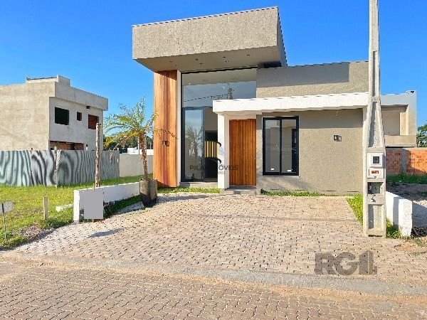 Casa Condominio em Porto Alegre, no bairro Hípica, com 3 dormitório(s), e 3 banheiros, à venda.
