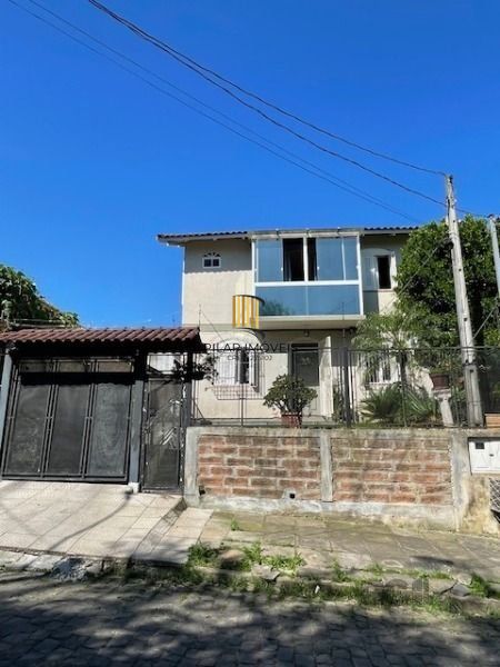 Casa em Porto Alegre, no bairro Vila Nova, com 3 dormitório(s), e 3 banheiros, à venda. - Pilar Imóveis