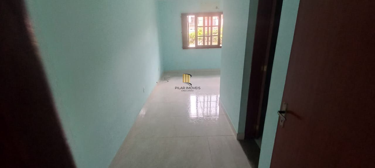 Casa 3 dormitórios no bairro Guarujá