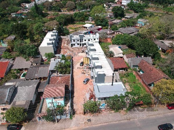 Casa Condominio em Porto Alegre, no bairro Vila Nova, com 2 dormitório(s), e 2 banheiros, à venda.