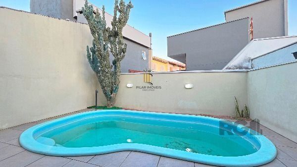 Casa em Porto Alegre, no bairro Hípica, com 3 dormitório(s), e 3 banheiros, à venda.