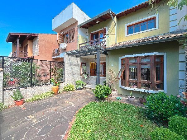 Casa em Porto Alegre, no bairro Hípica, com 3 dormitório(s), e 2 banheiros, à venda.