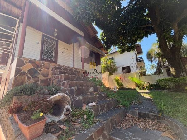 Casa 3 dormitórios no bairro Camaquã