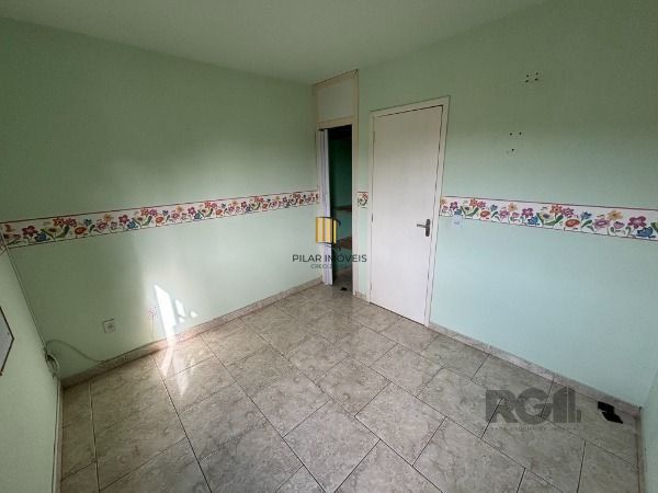 Casa Condominio em Porto Alegre, no bairro Vila Nova, com 3 dormitório(s), à venda.