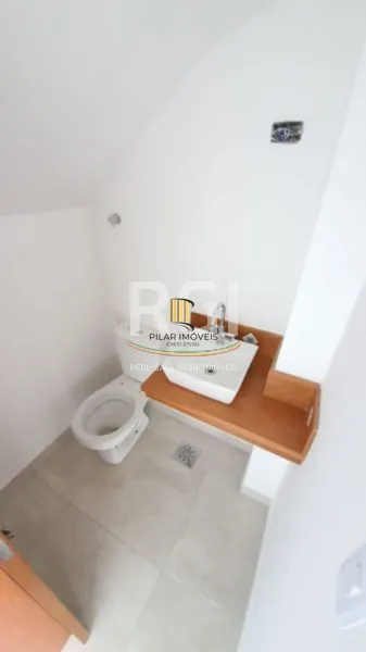 Casa 3 dormitórios no bairro Guarujá