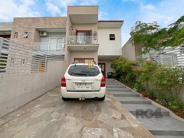 Casa 3 dormitórios no bairro Hípica