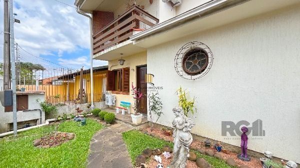Casa em Porto Alegre, no bairro Aberta dos Morros, com 3 dormitório(s), à venda.