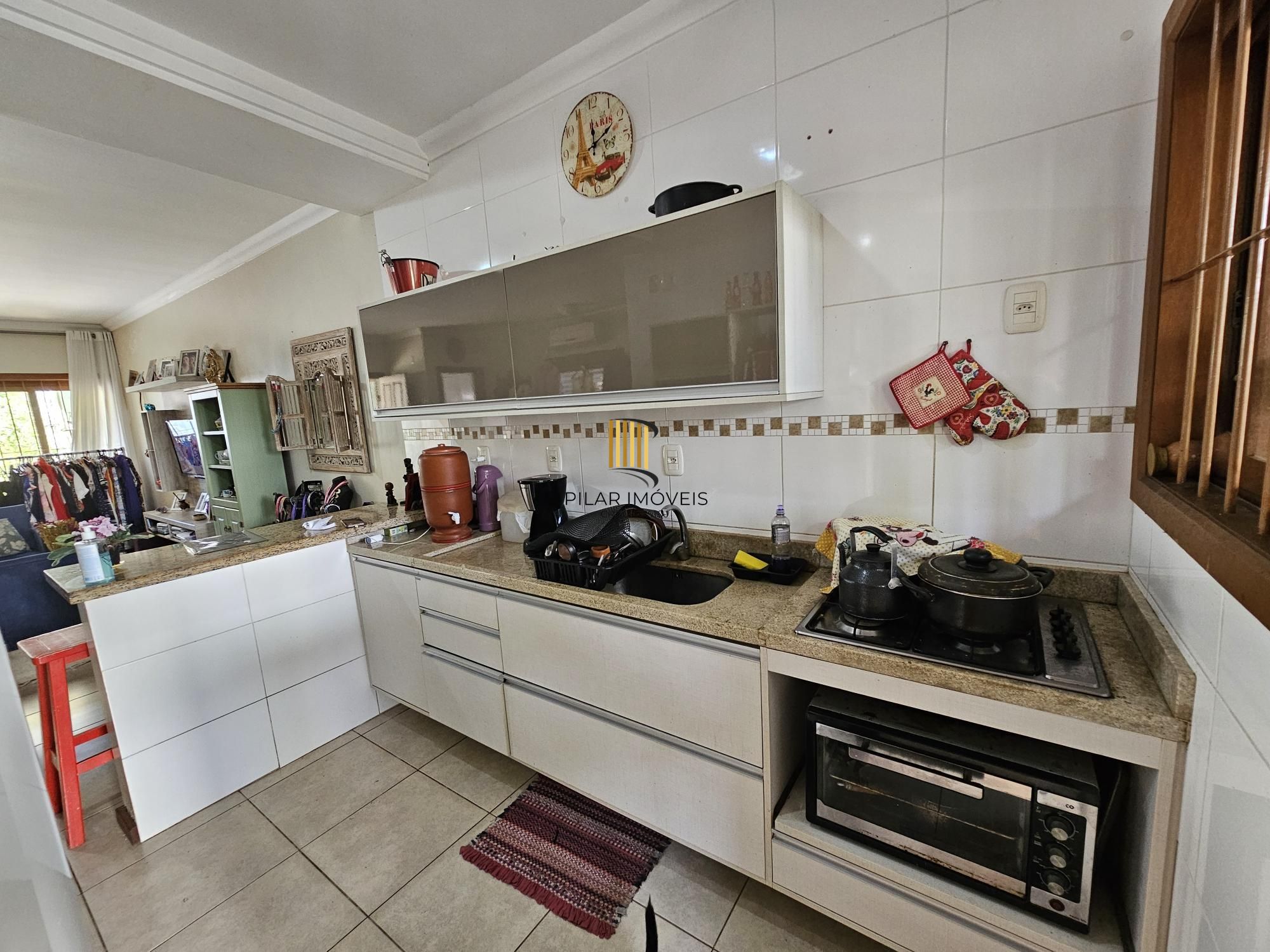 Casa 3 dormitórios no bairro Guarujá