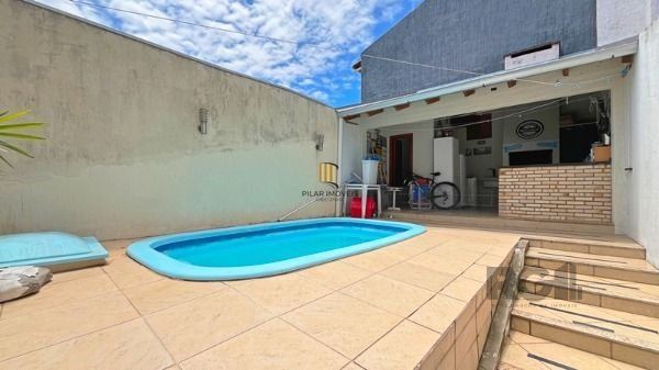 Casa em Porto Alegre, no bairro Tristeza, com 3 dormitório(s), e 3 banheiros, à venda.