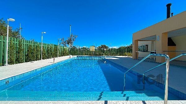 Casa Condominio em Porto Alegre, no bairro Hípica, com 3 dormitório(s), e 3 banheiros, à venda.