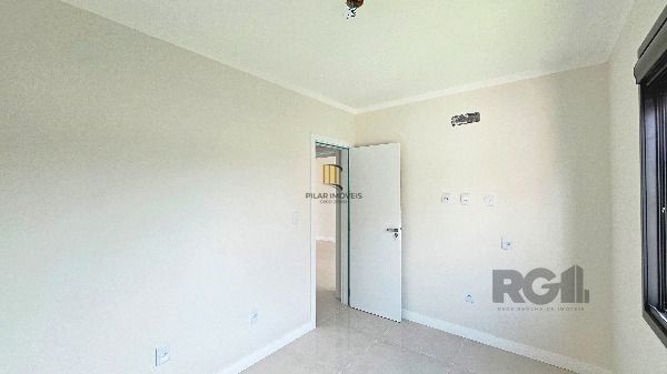 Casa Condominio em Porto Alegre, no bairro Hípica, com 3 dormitório(s), e 3 banheiros, à venda.