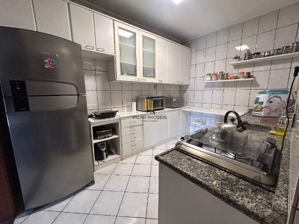 Casa 3 dormitórios no bairro Partenon
