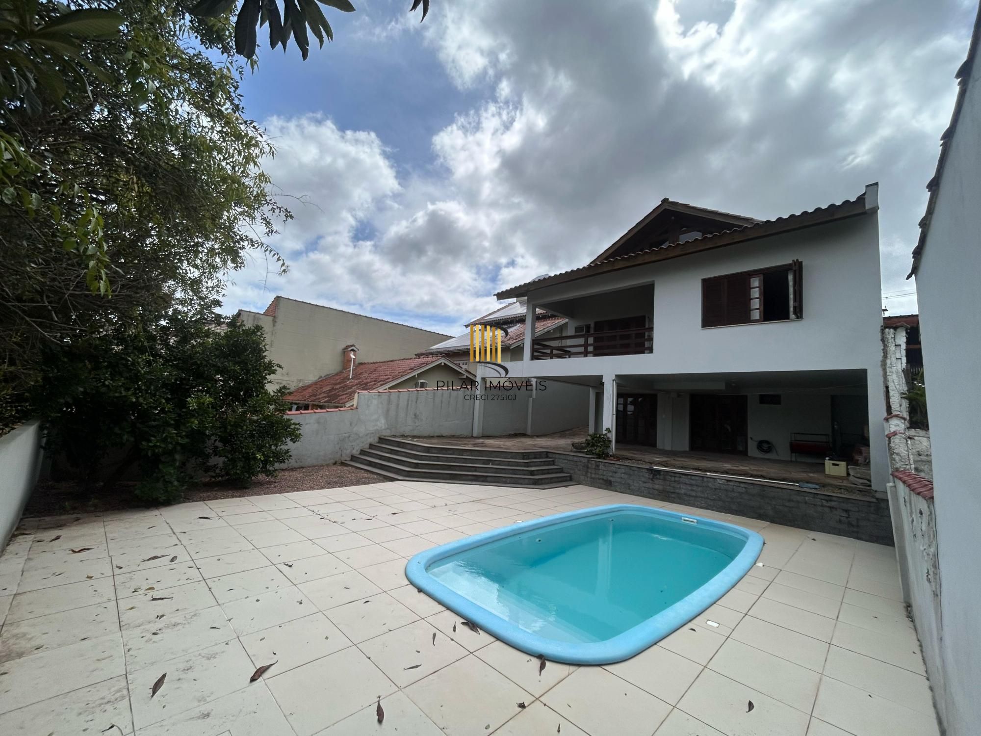 Casa 3 dormitórios no bairro Partenon