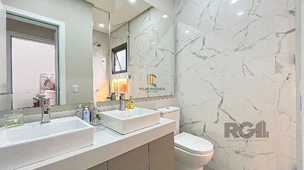 Casa Condominio em Porto Alegre, no bairro Hípica, com 3 dormitório(s), à venda.