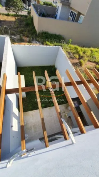 Casa 3 dormitórios no bairro Guarujá