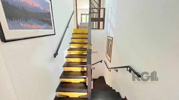 Casa 4 dormitórios no bairro Camaquã