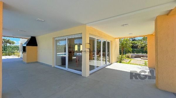 Casa Condominio em Porto Alegre, no bairro Hípica, com 3 dormitório(s), e 3 banheiros, à venda.