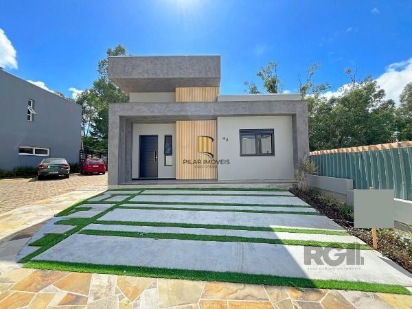 Casa em Porto Alegre, no bairro Hípica, com 3 dormitório(s), e 3 banheiros, à venda. - Pilar Imóveis