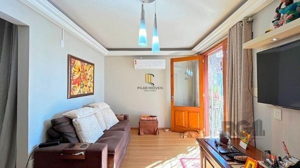 Casa Condominio em Porto Alegre, no bairro Santa Tereza, com 3 dormitório(s), e 3 banheiros, à venda.