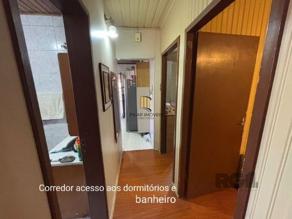 Casa 3 dormitórios no bairro Camaquã