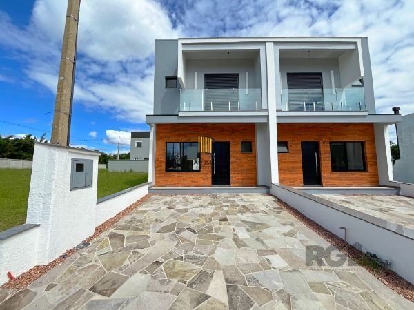 Casa Condominio em Porto Alegre, no bairro Campo Novo, com 3 dormitório(s), e 3 banheiros, à venda.