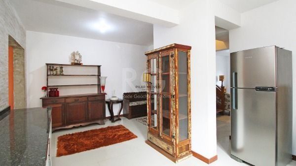 Casa em Porto Alegre, no bairro Hípica, com 3 dormitório(s), e 3 banheiros, à venda.
