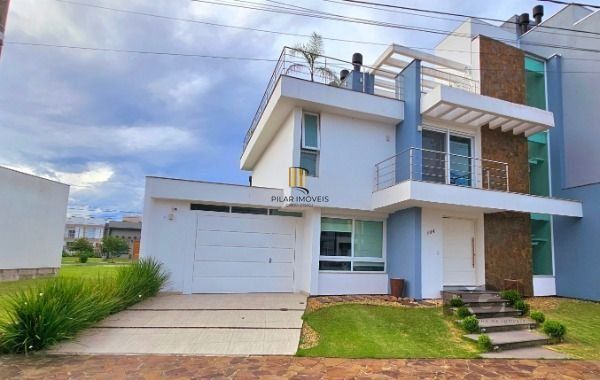 Casa em Porto Alegre, no bairro Hípica, com 3 dormitório(s), e 3 banheiros, à venda. - Pilar Imóveis